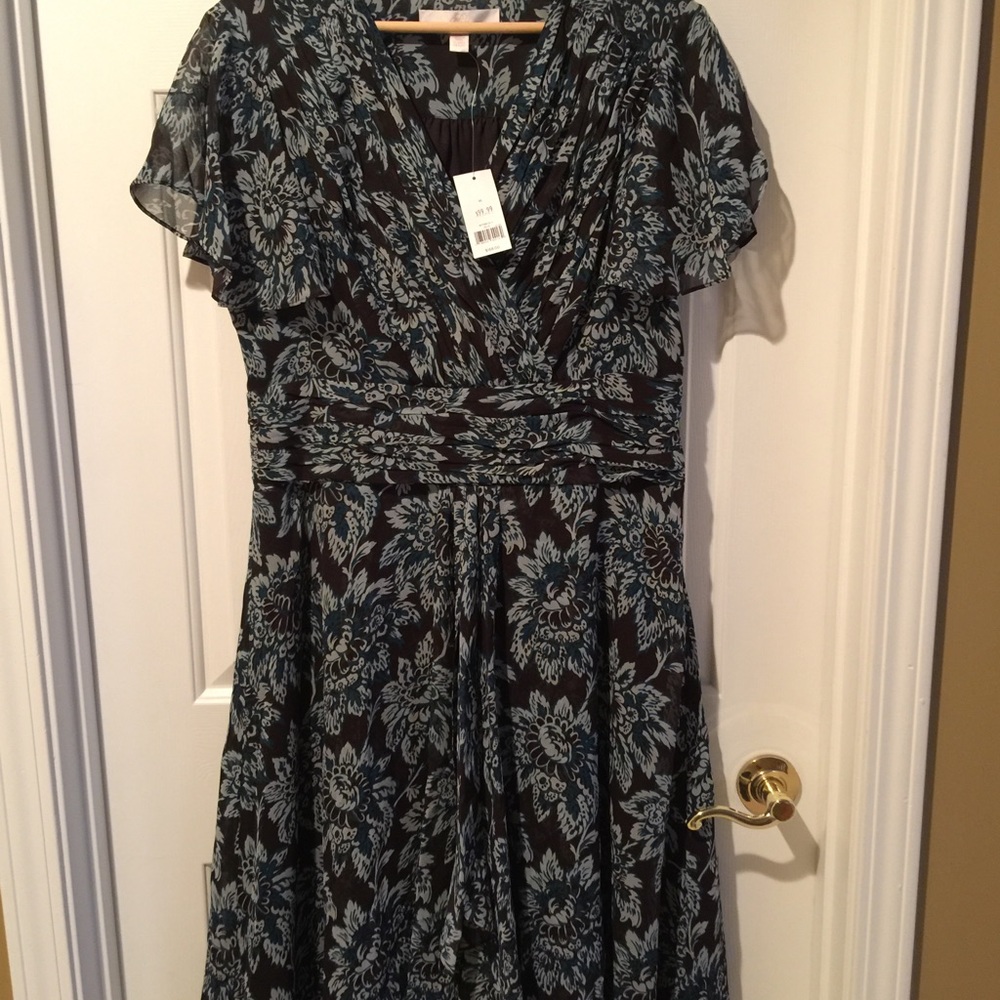 Very feminine dress.  Never worn